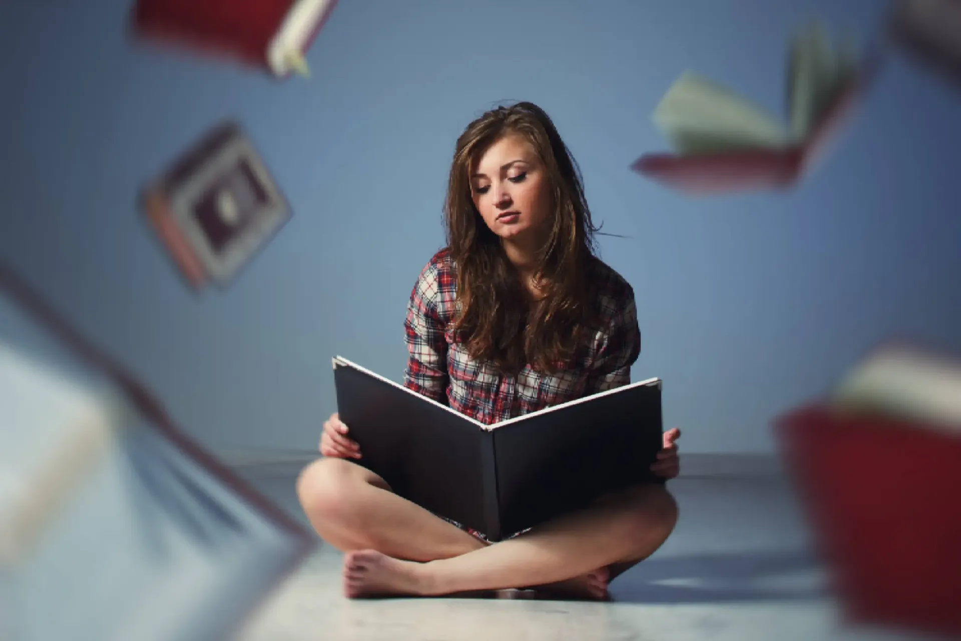 A reader exploring a book